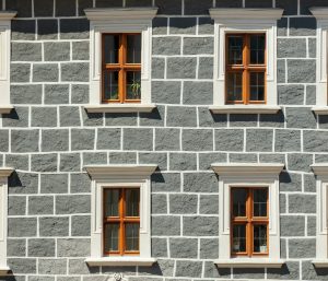 View on old windows in medieval house