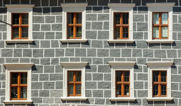 View on old windows in medieval house